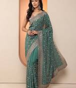 teal embellished saree with unstitched blouse piece