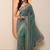 teal embellished saree with unstitched blouse piece