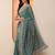 teal embellished saree with unstitched blouse piece
