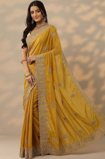 yellow embroidered saree with unstitched blouse piece