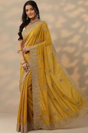 yellow embroidered saree with unstitched blouse piece