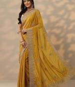yellow embroidered saree with unstitched blouse piece