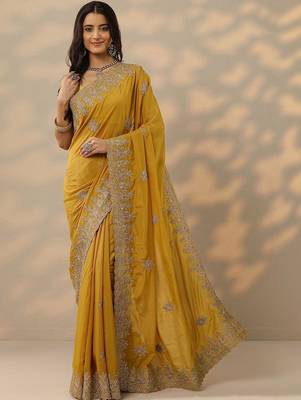 yellow embroidered saree with unstitched blouse piece 2