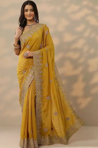 yellow embroidered saree with unstitched blouse piece