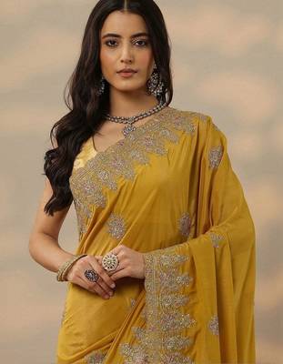 yellow embroidered saree with unstitched blouse piece 3