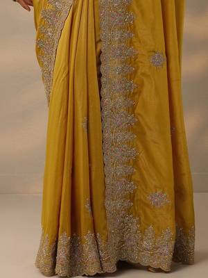 yellow embroidered saree with unstitched blouse piece 5