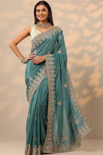 teal embroidered saree with unstitched blouse piece