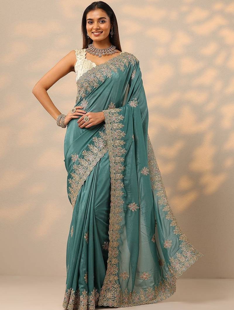 teal embroidered saree with unstitched blouse piece