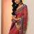 red printed saree with unstitched blouse piece