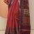 red printed saree with unstitched blouse piece