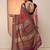 red printed saree with unstitched blouse piece