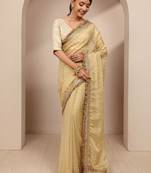 cream woven design tissue saree with unstitched blouse piece