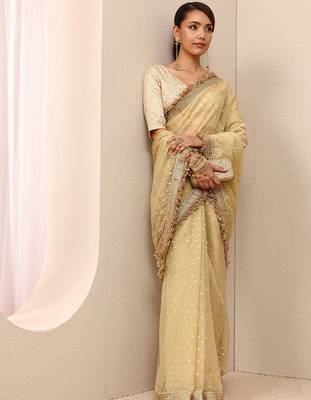 cream woven design tissue saree with unstitched blouse piece 4
