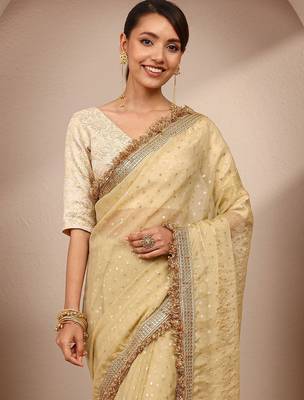 cream woven design tissue saree with unstitched blouse piece 5