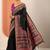 black printed saree with unstitched blouse piece