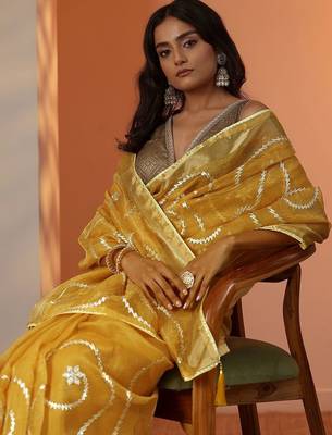 yellow embellished nylon saree with unstitched blouse piece 1