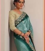 teal embellished crepe saree with unstitched blouse piece