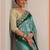 teal embellished crepe saree with unstitched blouse piece