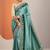 teal embellished crepe saree with unstitched blouse piece