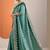 teal embellished crepe saree with unstitched blouse piece