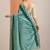 teal embellished crepe saree with unstitched blouse piece