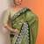 green embellished crepe saree with unstitched blouse piece