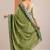 green embellished crepe saree with unstitched blouse piece