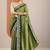 green embellished crepe saree with unstitched blouse piece
