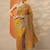 yellow embellished saree with unstitched blouse piece