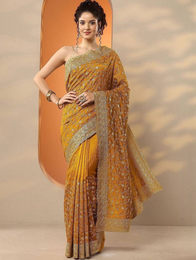yellow embellished saree with unstitched blouse piece
