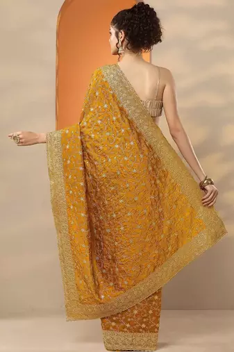 yellow embellished saree with unstitched blouse piece