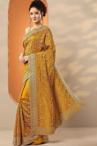 yellow embellished saree with unstitched blouse piece