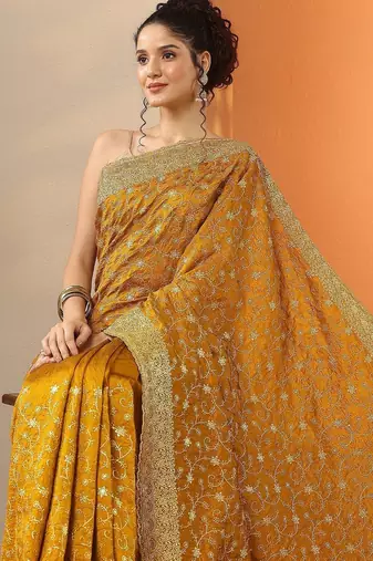 yellow embellished saree with unstitched blouse piece