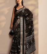 black woven design saree with unstitched blouse piece