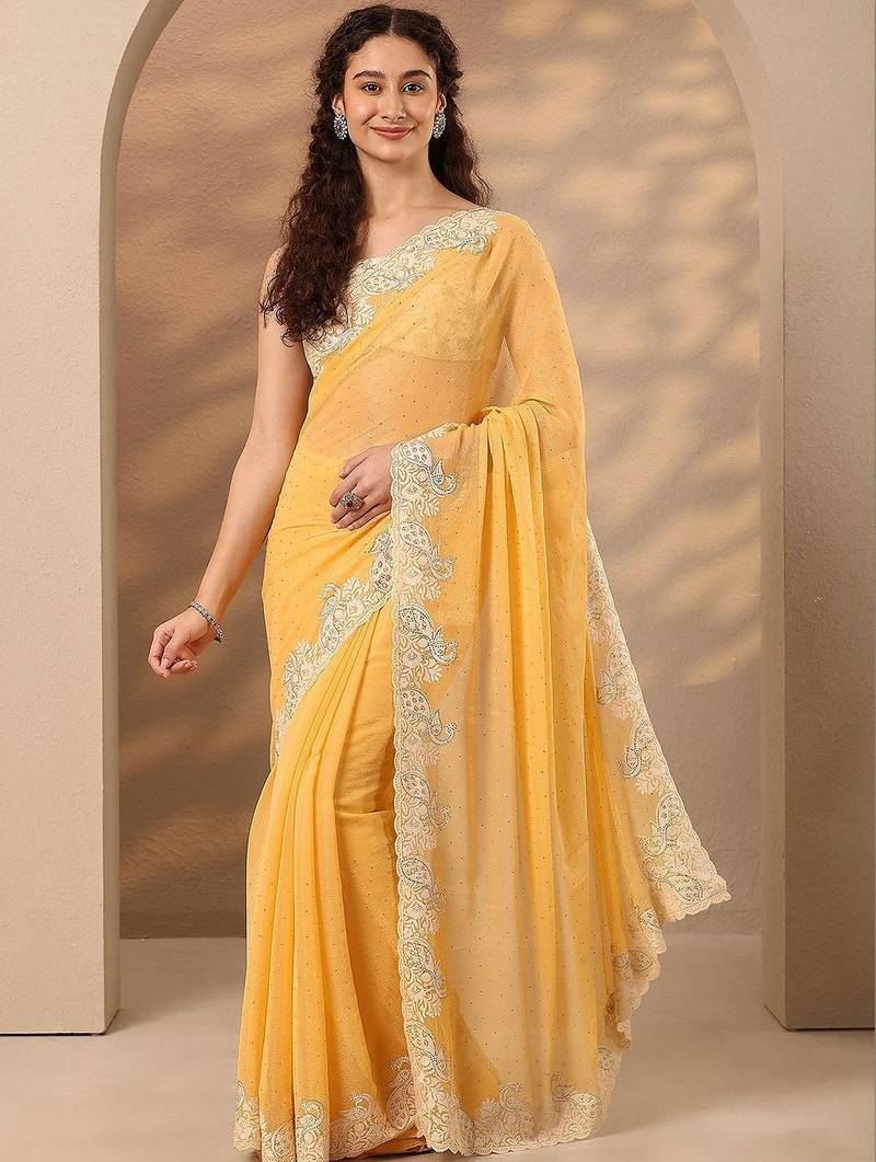 yellow embellished saree with unstitched blouse piece