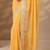 yellow embellished saree with unstitched blouse piece