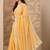 yellow embellished saree with unstitched blouse piece