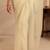 cream tissue saree