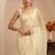 cream tissue saree