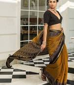 mustard printed saree with unstitched blouse piece