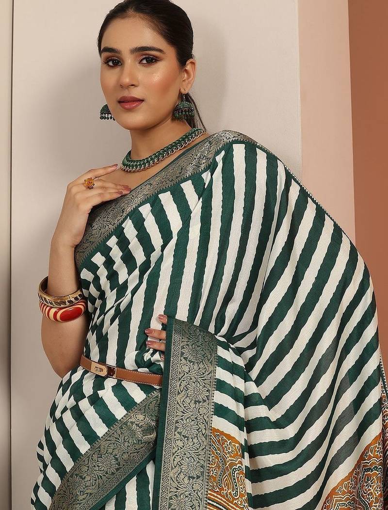 white printed saree with unstitched blouse piece