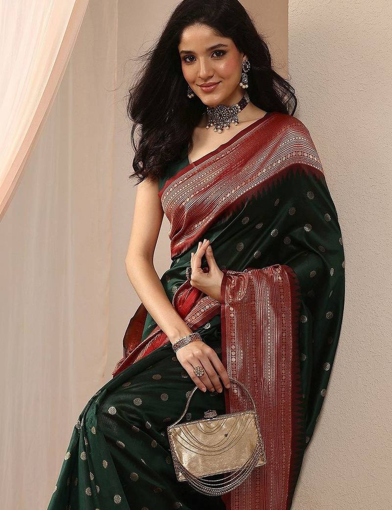 green woven design saree with unstitched blouse piece