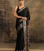 black solid saree with unstitched blouse piece