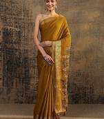 mustard solid saree with unstitched blouse piece