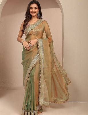 green solid saree with zari taping border and a blouse piece 1