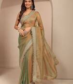 green solid saree with zari taping border and a blouse piece