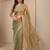 green solid saree with zari taping border and a blouse piece