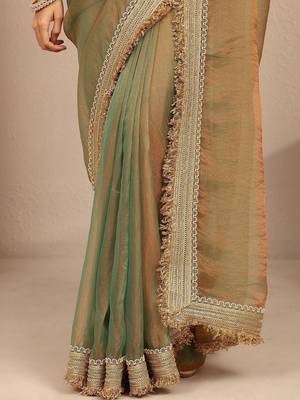 green solid saree with zari taping border and a blouse piece 3