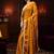 mustard embellished satin saree with gota border