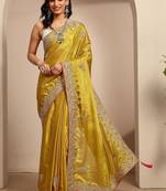 yellow embroidered saree with unstitched blouse piece